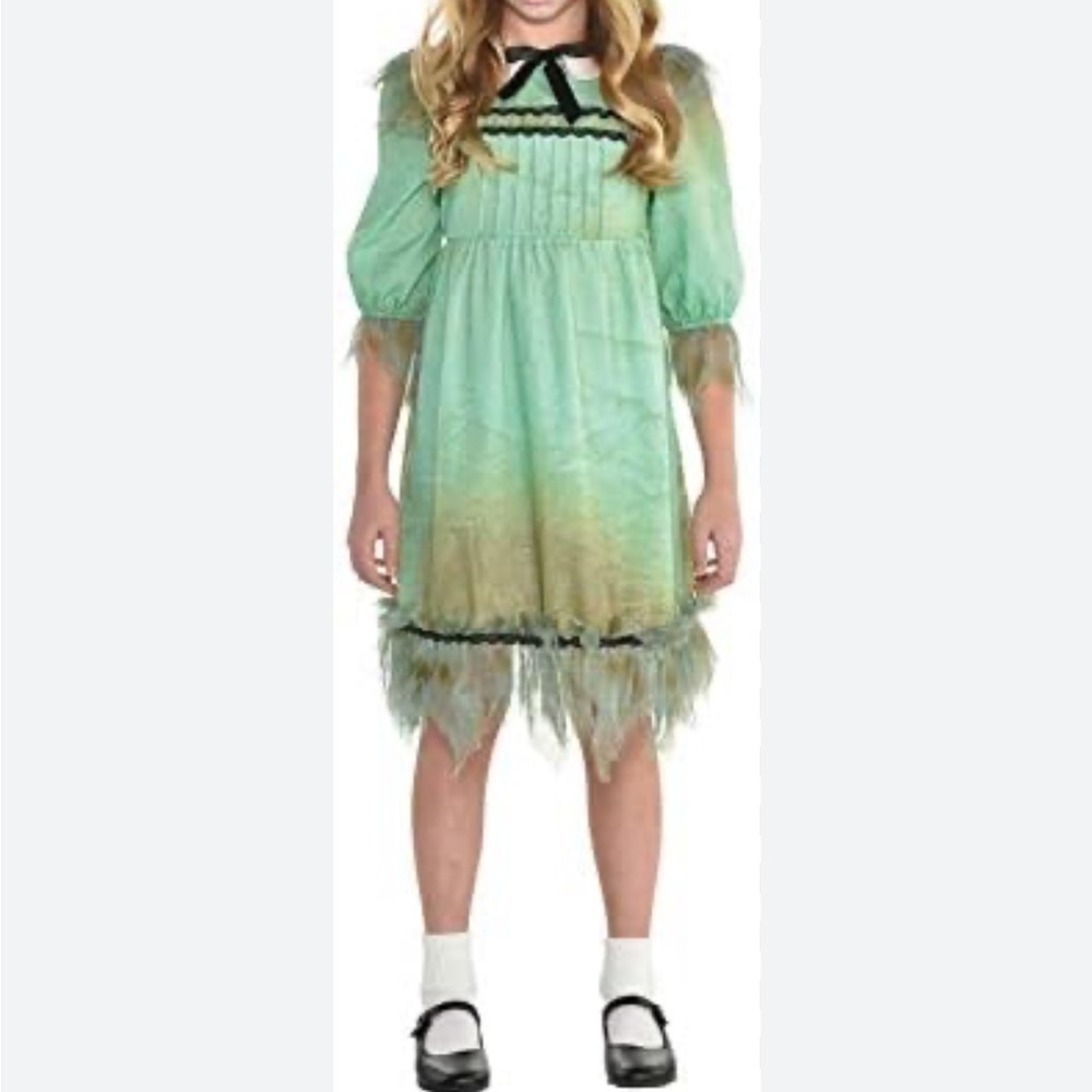 Never worn creepy girl Halloween costume . Youth size large 12-14
